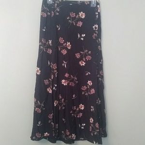 Preowned black floral skirt size medium